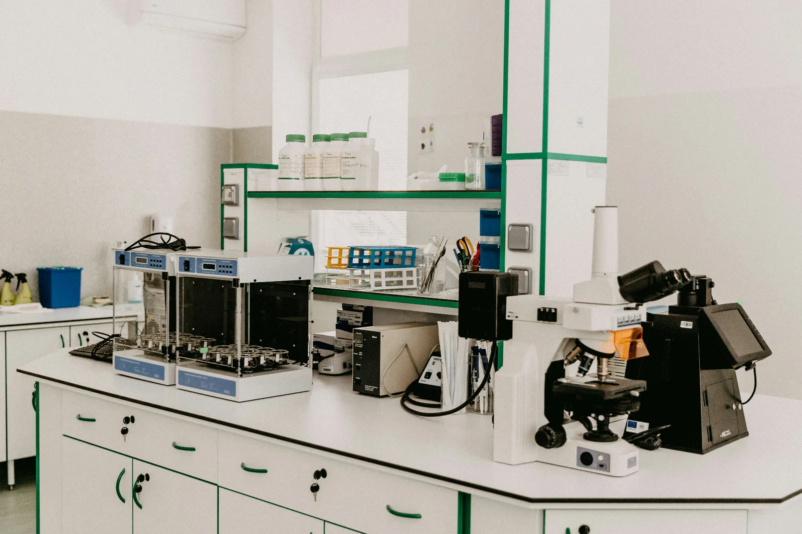 UK GMP laboratory bench with analytical instruments used for raw material testing